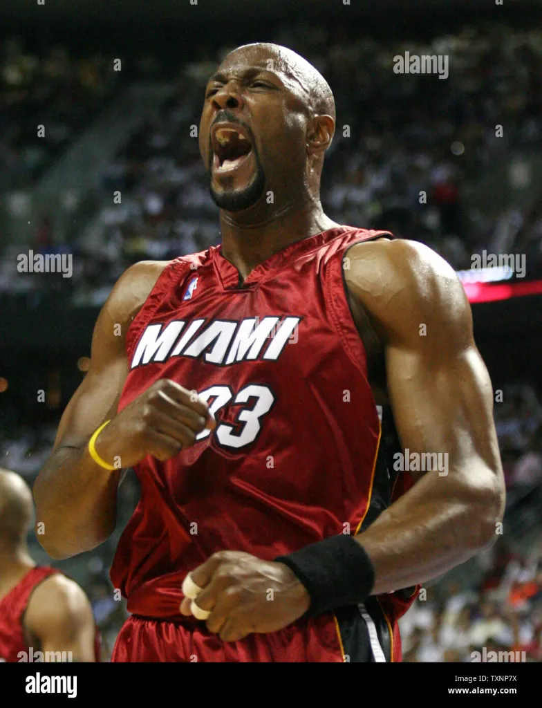 miami-heat-center-alonzo-mourning-33-celebrates-in-the-fourth-quarter-against-the-detroit-pistons-at-the-palace-of-auburn-hills-in-auburn-hills-mi-on-may-23-2006-the-heat-defeated-the-pistons-91-86-to-win-the-first.webp